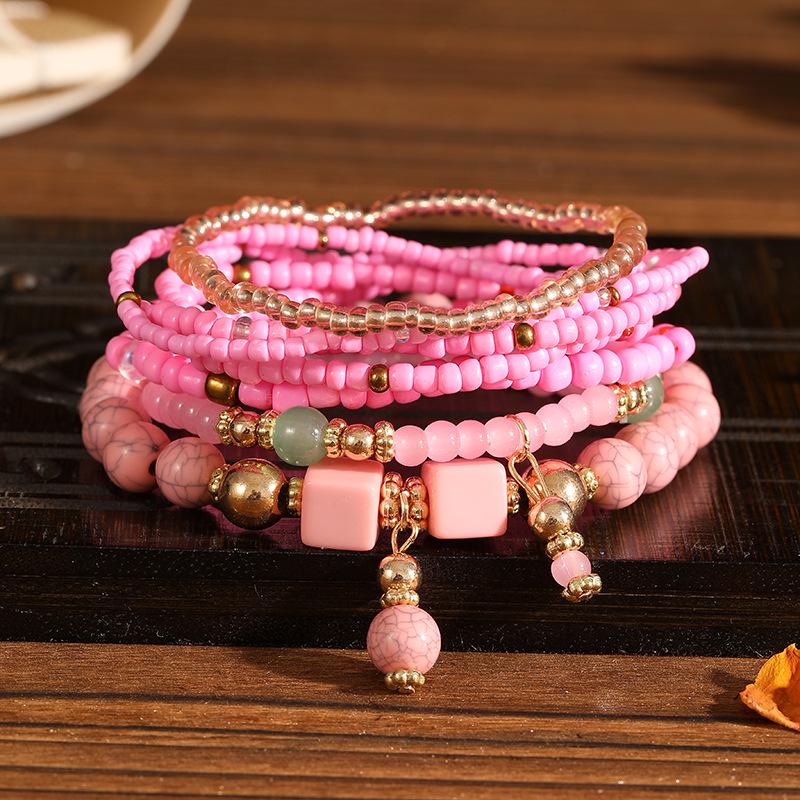 Böhmisches mehrlagiges elastisches Armband-Set: 8 Stränge kreativer Reiskornschmuck