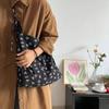 Niche versatile canvas bag shoulder messenger bag black floral printed bag for women
