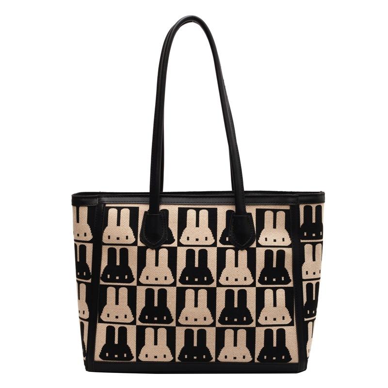 This year's popular bag women's 2025 new fashion niche shoulder canvas bag versatile large-capacity commuter tote bag