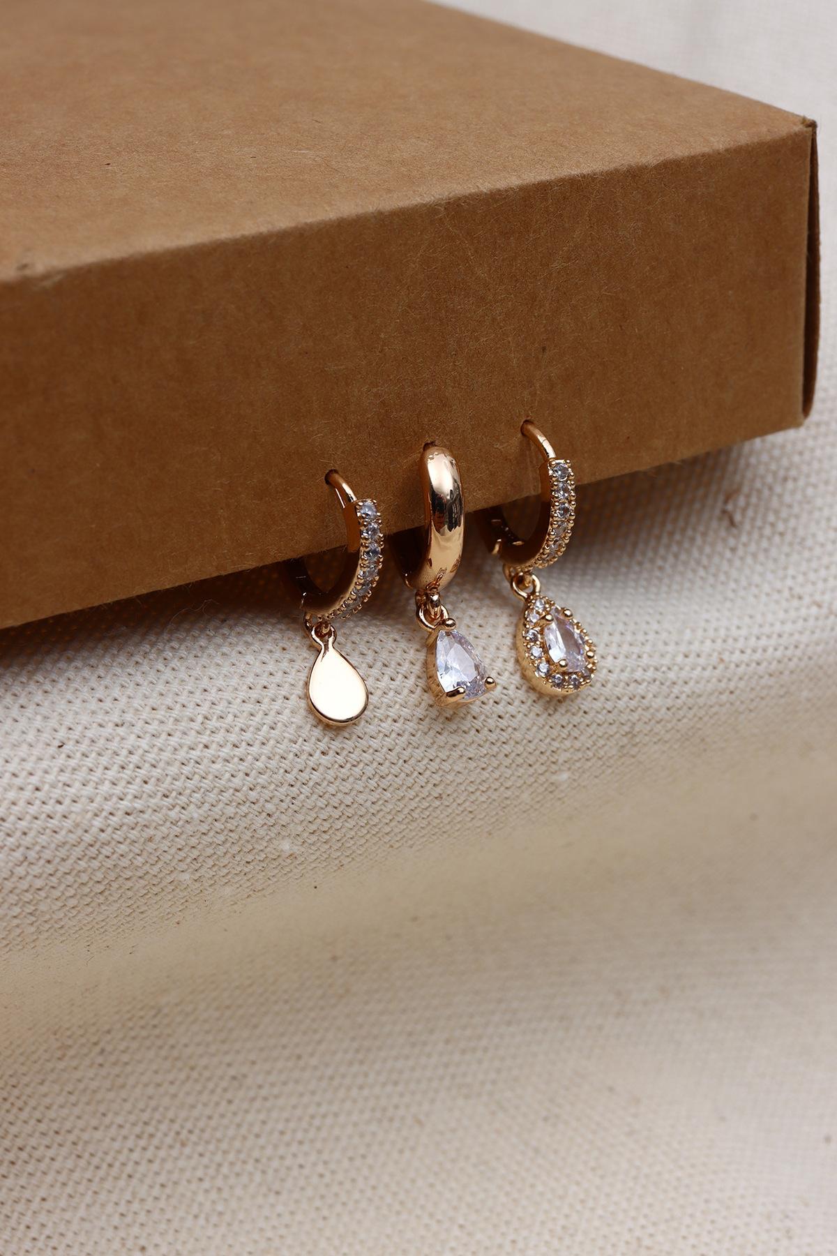 

Серьги-капли из трех частей золотого цвета