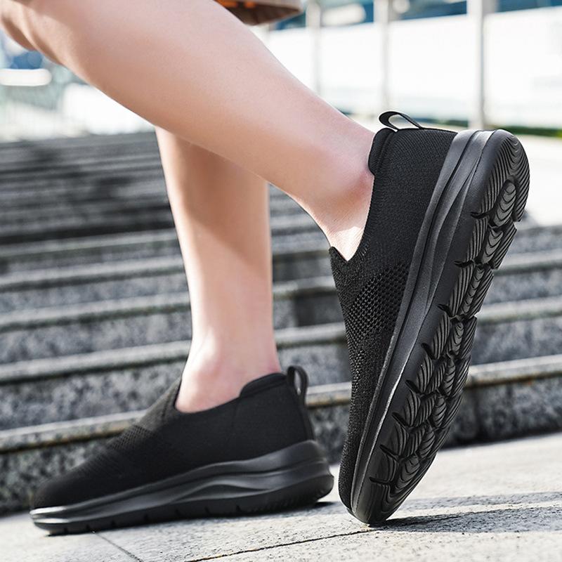 All Black Single Net Flying Knitting Solid Color Casual Sports Shoes Elastic Surface Comfortable Soft Baseplate Shoes
