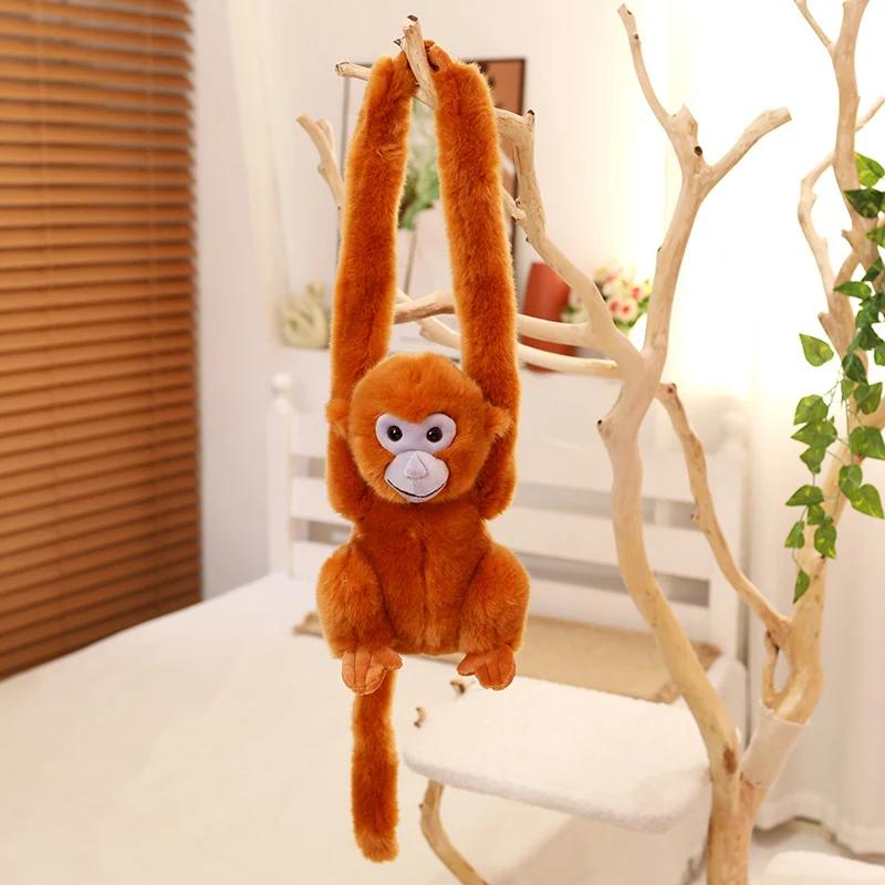 Simulation Niedliches Affen-Stofftier Goldener Affe Puppe Langarm-Affe Hochwertige Gardinenbinder-Dekorationen Stofftiere Heimdekoration 75cm