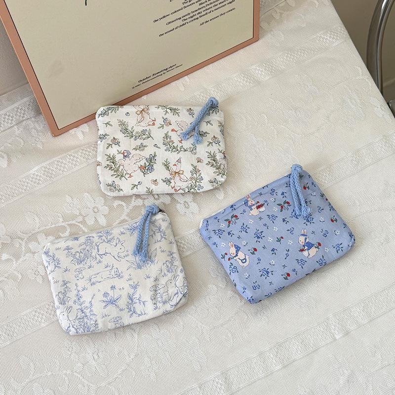 Adorable Blue Cartoon Makeup Bag: Mini Pure Cotton Coin and Earphone Pouch, Lipstick Carrier, Portable Storage.