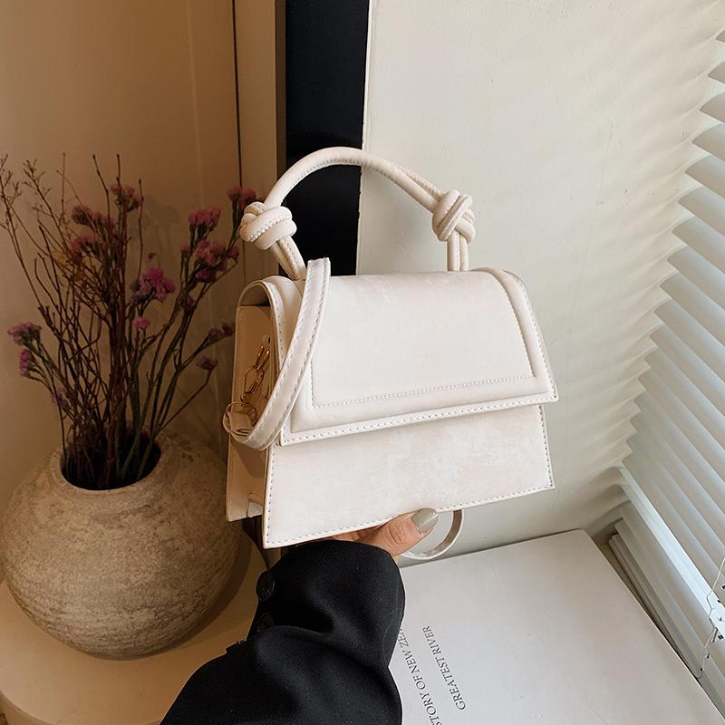 Eine stilvolle einfarbige PU-Material Damen-Schultertasche Handtasche, eine Vielzahl von Macaron-Farben, zart und klein, neu