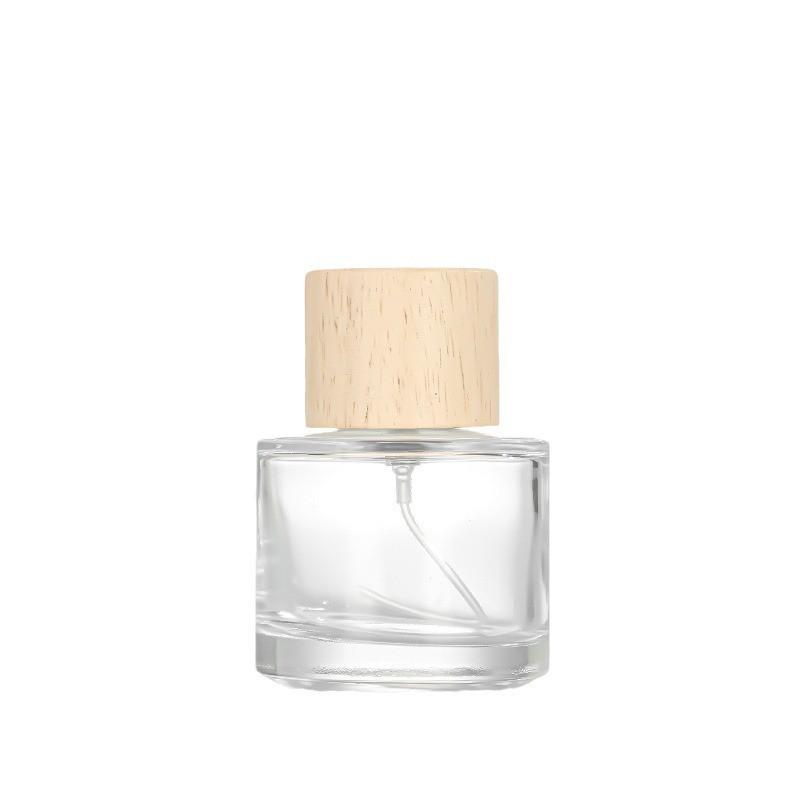 30ml Transparent Cylindrical Glass Perfume Bottle with Snap-on Spray Cap