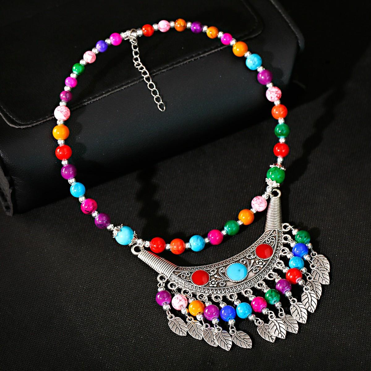 

Богемный этнический стиль Натуральный камень Бирюза Ожерелье Сплав Подвеска Металлическое перо Кисточка Ожерелье Циркон Аксессуары Женское