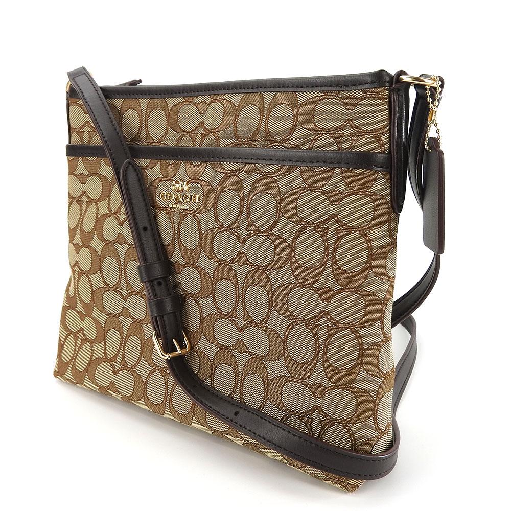 Gebrauchte COACH Umhängetasche F29960 Canvas mit Signature-Muster/Leder beige Dunkelbraun Diagonal getragen
