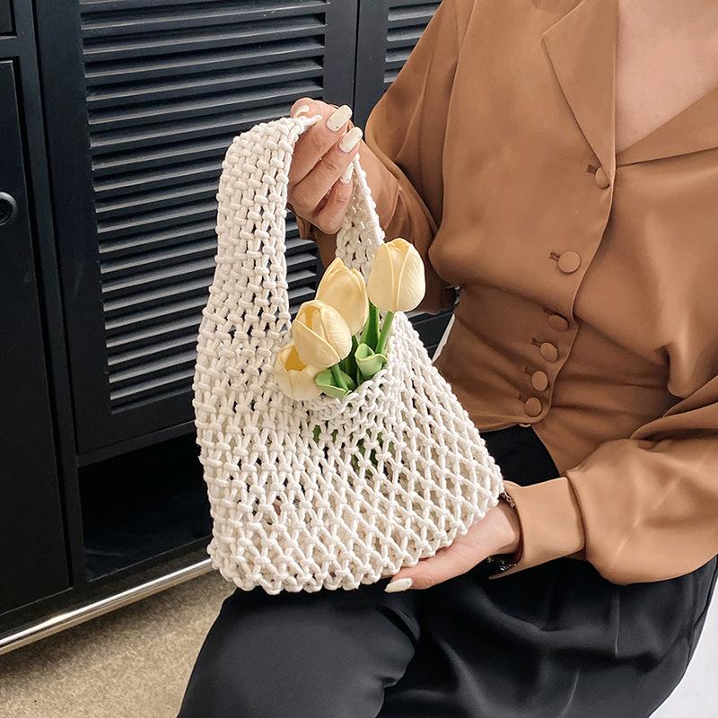 Borsa a Mano a Rete Vuota di Nicchia Borsa da Polso Intrecciata a Mano Borsa Versatile per Vacanze al Mare Tendenza