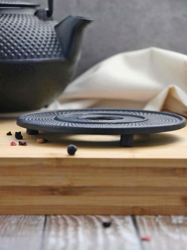 Cast Iron Protective Stand For A Hot Kettle Pot