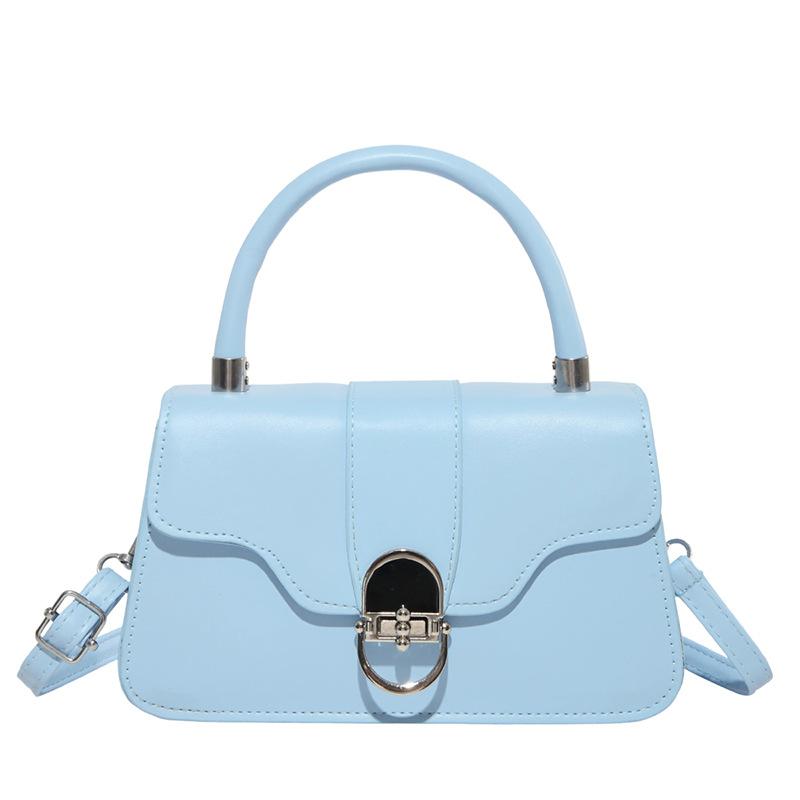 

New spring and summer armpit bag Maillard retro shoulder bag hardware lock flap commuter bag bag woman синій