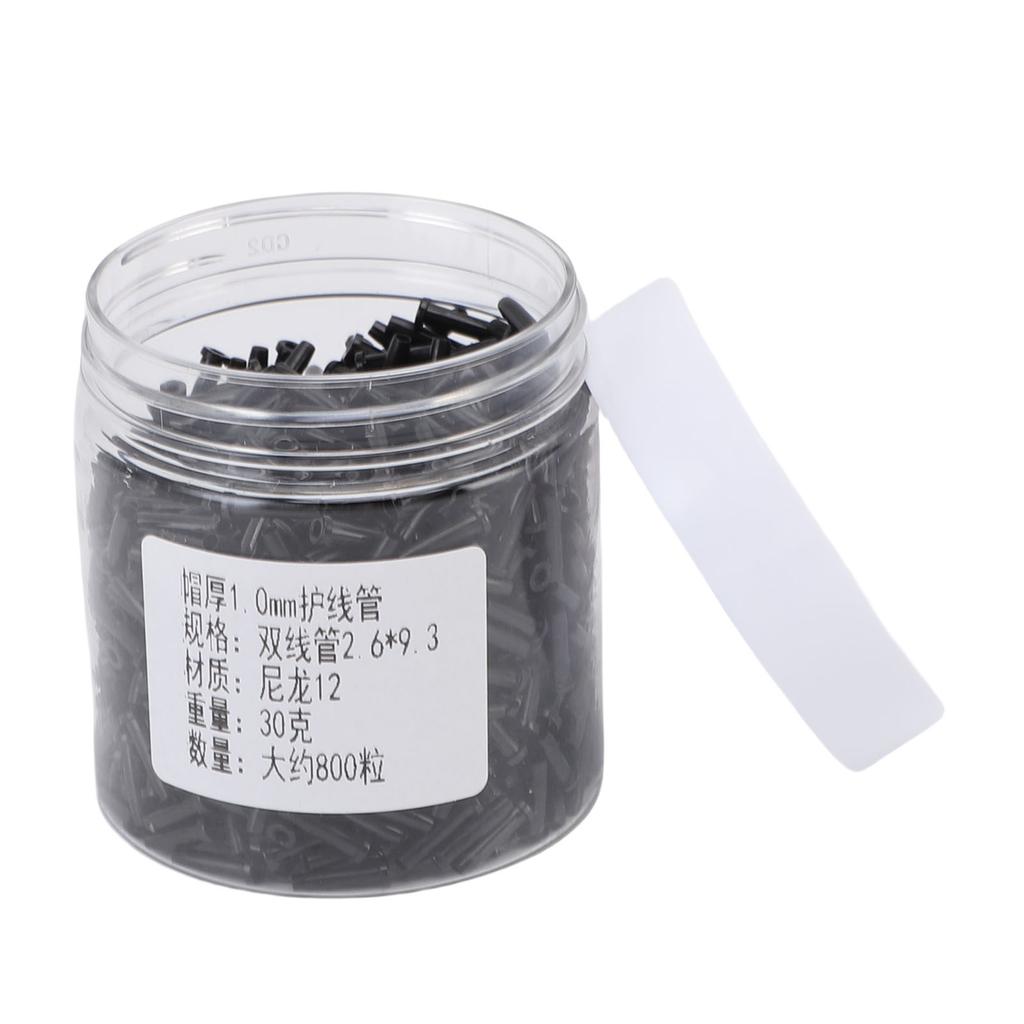 1 krabička badmintonových průchodek na raketu s dvojitým drátěným otvorem Chránič strun na badminton Tloušťka krytky 1,0 mm 2,6x9,3 mm N12 Černý