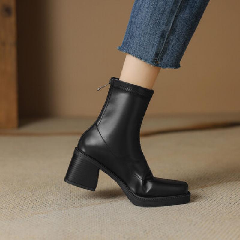 Autumn and winter women's leather boots solid color round head high heel women's boots comfortable rear zipper large size medium boots new Martin boo
