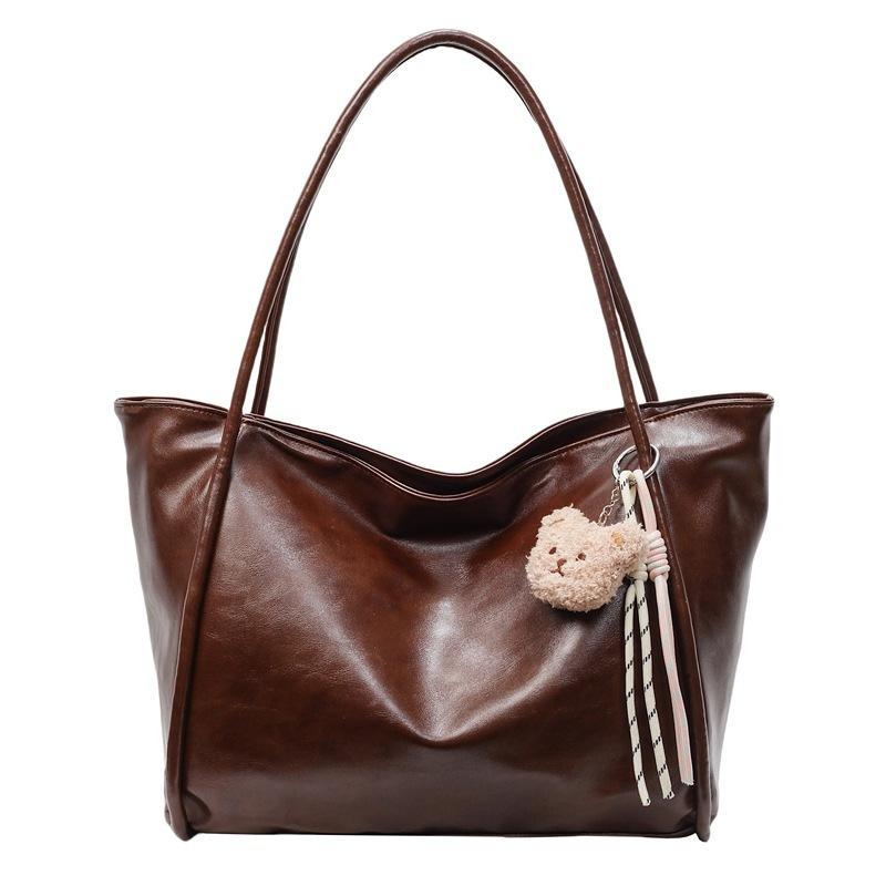 

Весна и лето новая сумка-тоут большой вместимости из мягкой кожи Макарон для студенток для поездок на занятия, универсальная текстурная наплечная сумка Send pendant темно-коричневого