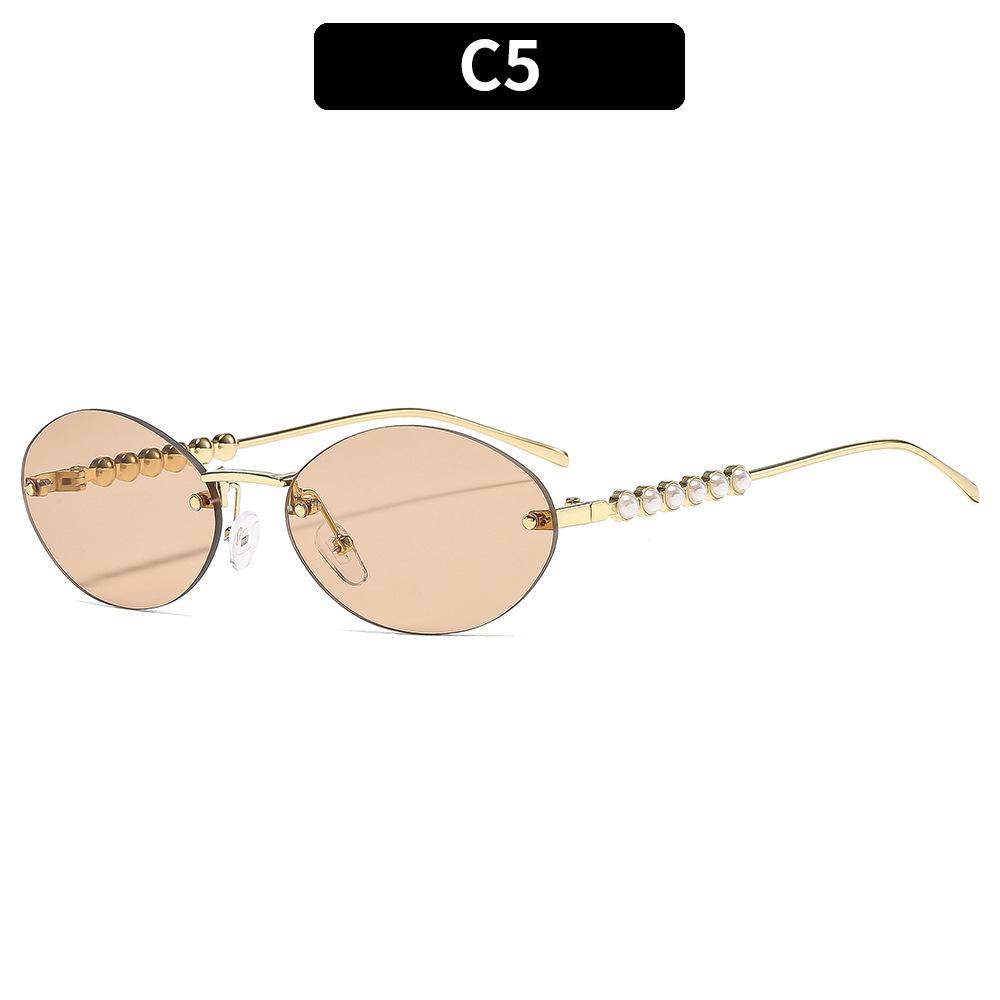 Ladies sunglasses, rimless oval sunglasses, pearl embellished sunglasses.