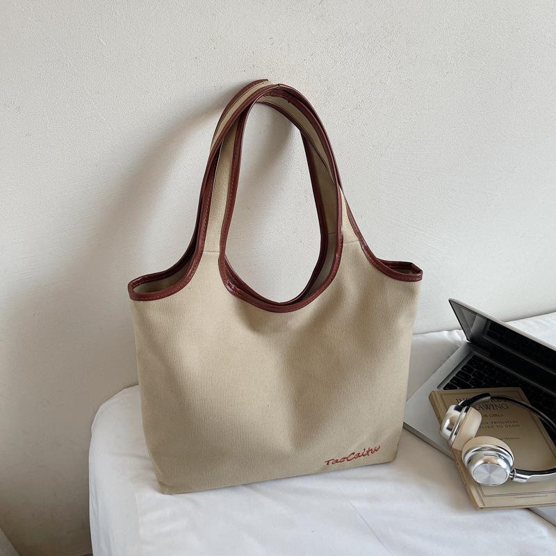 

2025 осень новая мода простая однотонная портативная наплечная холщовая сумка большой вместимости студенческая сумка-тоут для поездок на работу хаки