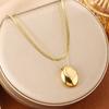 Gold Oval Pendant Necklace - Elegant Titanium Steel, Clavicle Chain, Colorfast, High-End Niche Design for Women