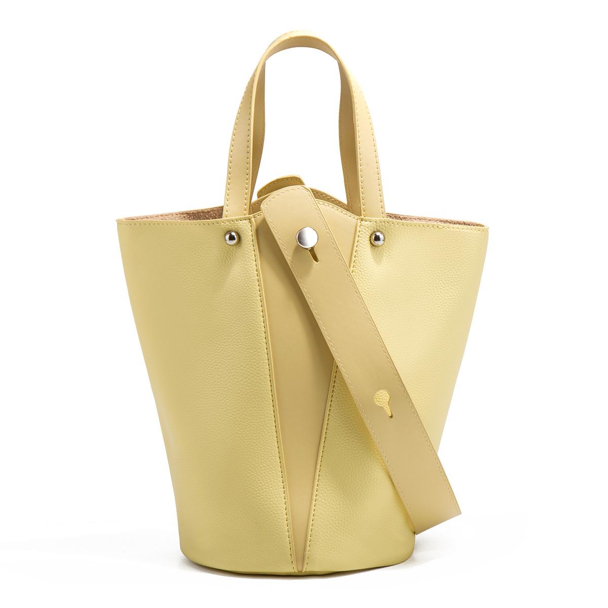 

Small bucket bag women s high-end bag 2025 new niche vegetable basket women s bag super hot portable messenger bag summer светло-желтого