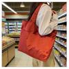 European-American Fashion Large Capacity Travel Bag - Solid Color, Nylon, Handheld or Shoulder Style for Women