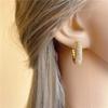 Huitan Boucles d'oreilles créoles creuses couleur or pour femmes pavées de pierres CZ éblouissantes, bijoux de déclaration tendance de luxe pour femmes