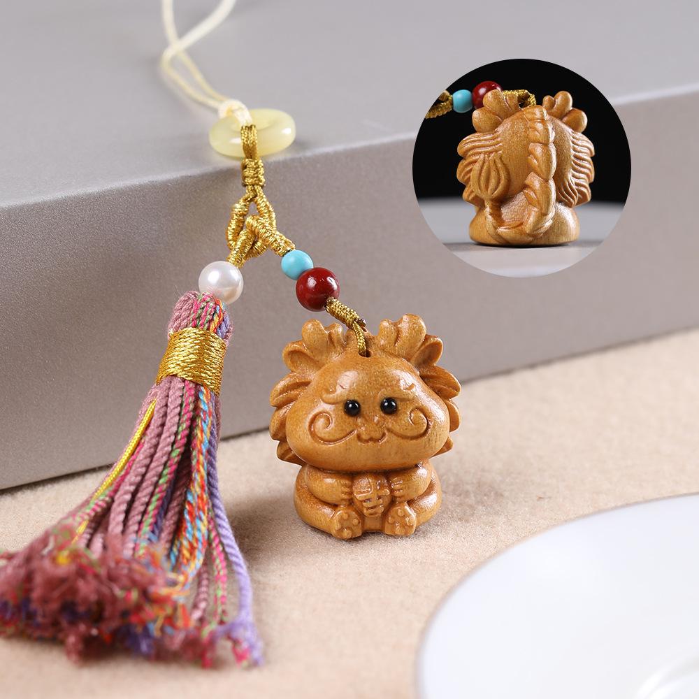 

Sandalwood Zodiac Animal Keychain with Colorful Tassel