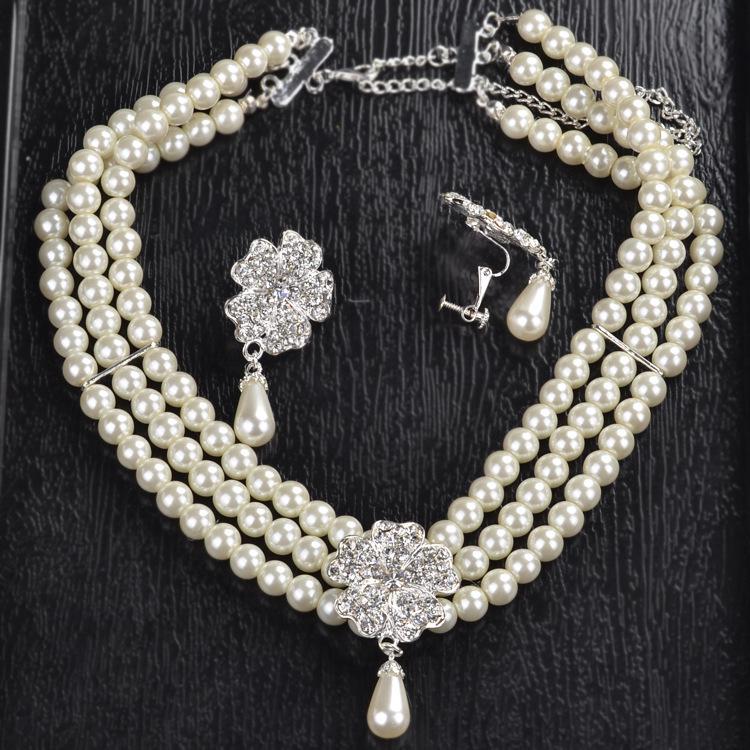 Свадебный комплект из четырехрядного жемчужного ожерелья и серег - Свадебные и вечерние аксессуары