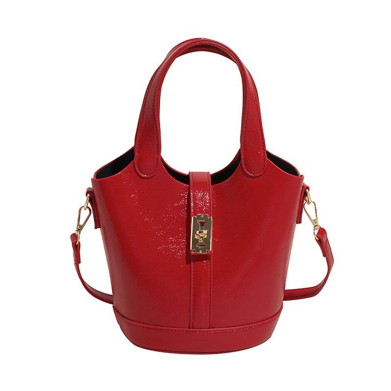 This Year's Popular Fashion Korean Version of Simple Solid Color Portable Bucket Bag Women's Casual Versatile Commuter Messenger Child and Mother Bag