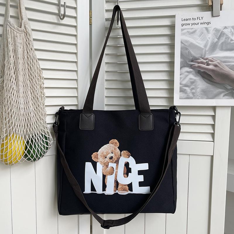 Simple canvas large-capacity bag women's summer new shoulder fashion letter tote bag messenger bag bag