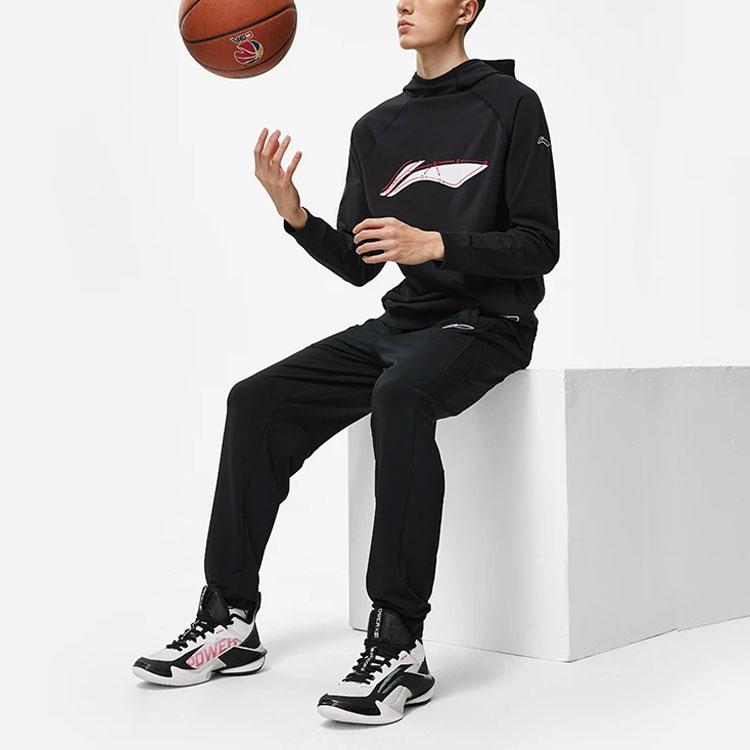 Li-Ning Profesionálna basketbalová séria Jednofarebné pletené športové nohavice stredného pása pre mužov Čierne AKLT883-1