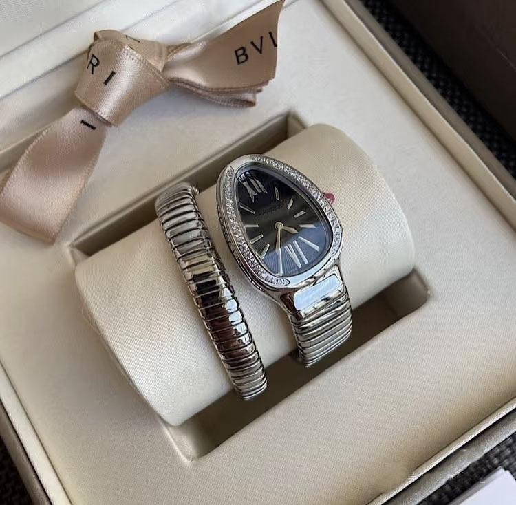 Orologio da donna al quarzo con cinturino in acciaio a due cerchi a forma di serpente, personalità, completamente diamantato, produttore