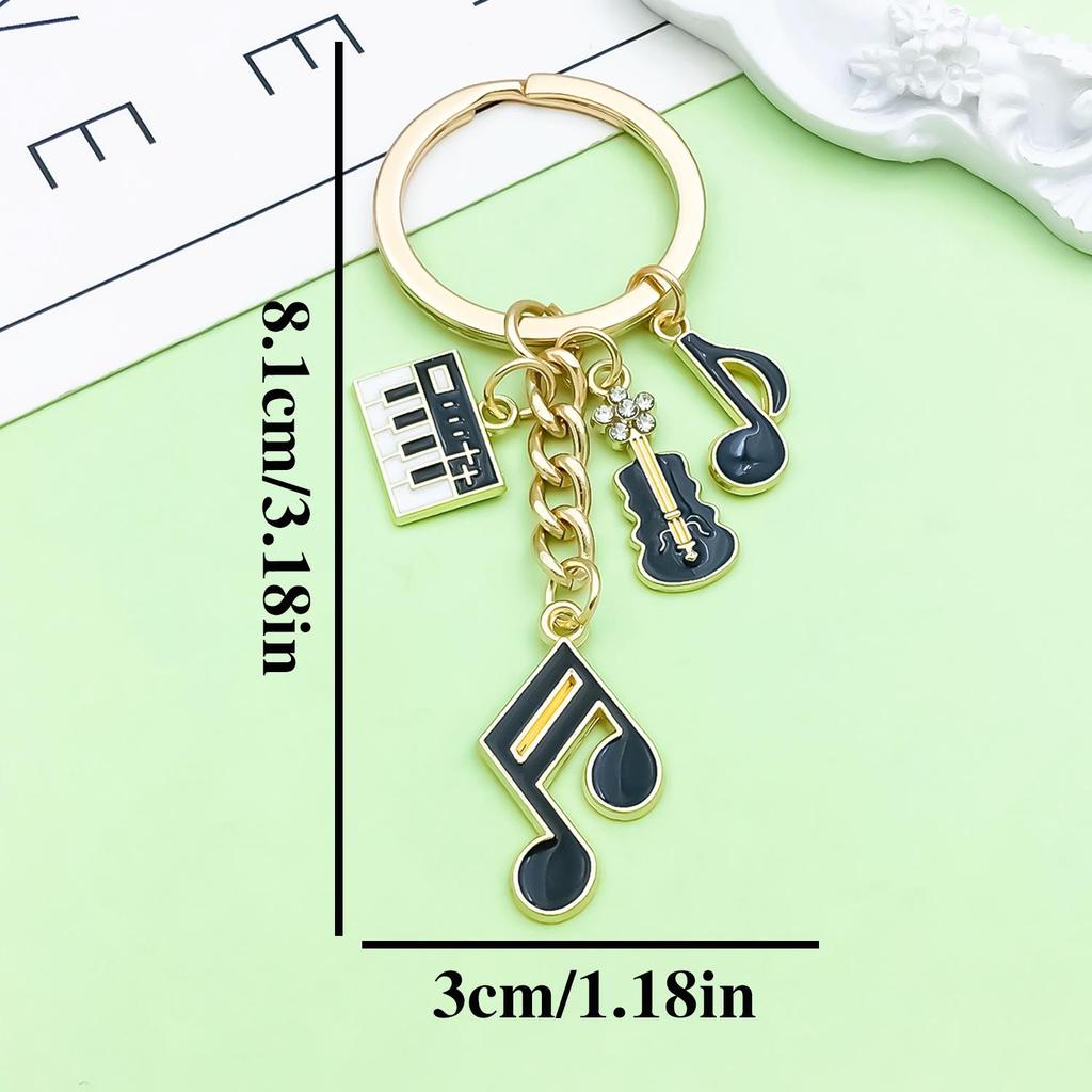 Antique Silver Music Cassette & Saxophone Keychain with Creative Design