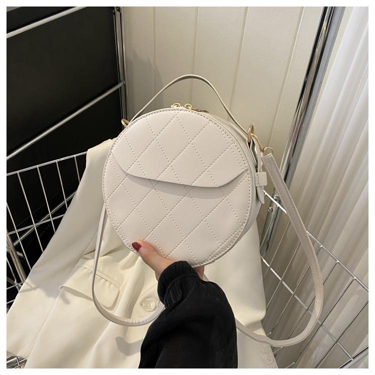 

Модна маленька кругла сумка жіноча сумка 2024 осінь і зима нова модна діамантова універсальна мода для приміських поїздок проста сумка через плече білий