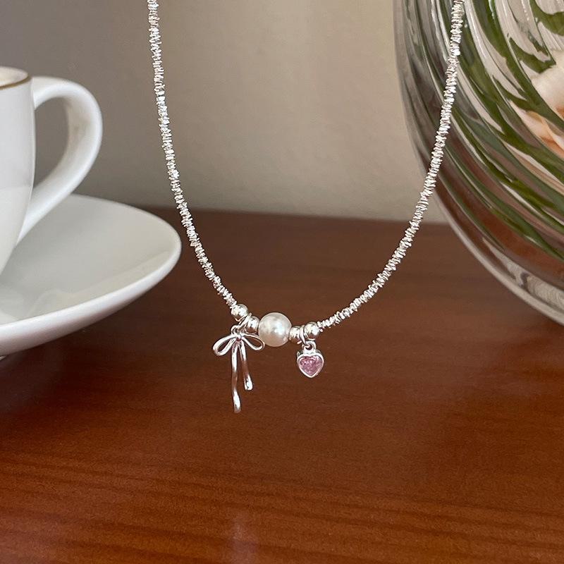 

Ожерелье Banyan Tree из серебра 925 пробы с балетным бантом, розовым бриллиантом и жемчугом NS2834 серебряный