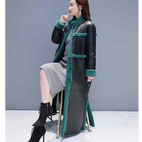 Lammhaar, weiblich, lockerer langer Absatz, über dem Knie, Fell, auf einer Seite, trägt Kleidung aus PU-Leder und Baumwolle