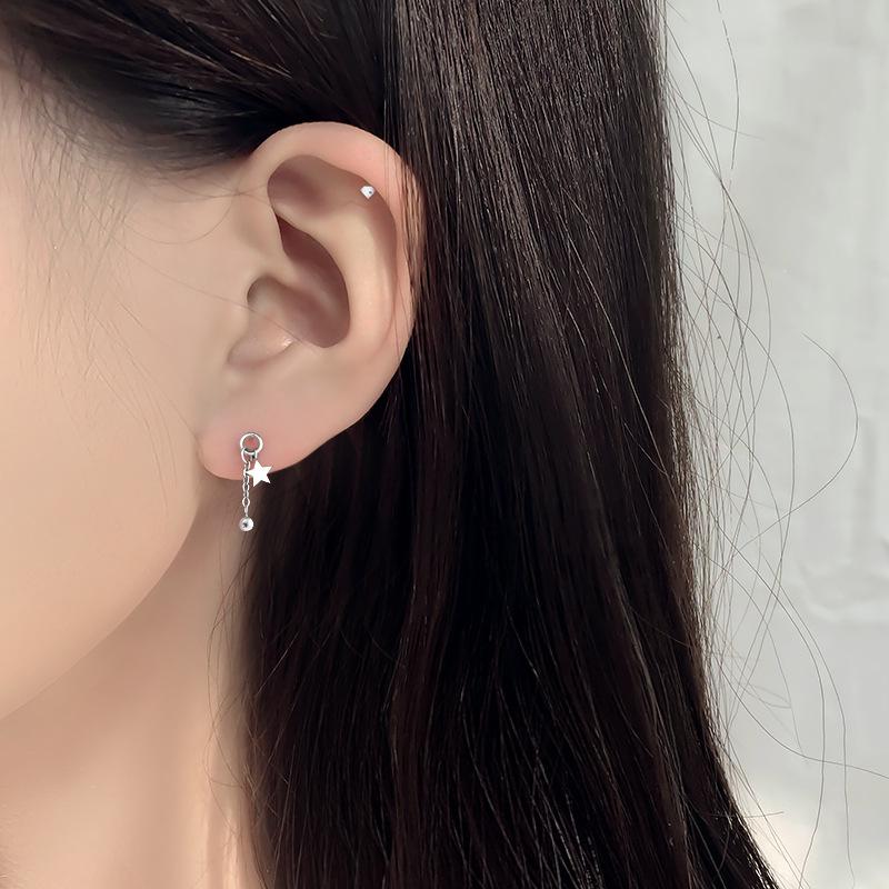 Gu Maoning 2025 Trendy Hollow Star Tassel Earrings - Fashion for Women & Students.