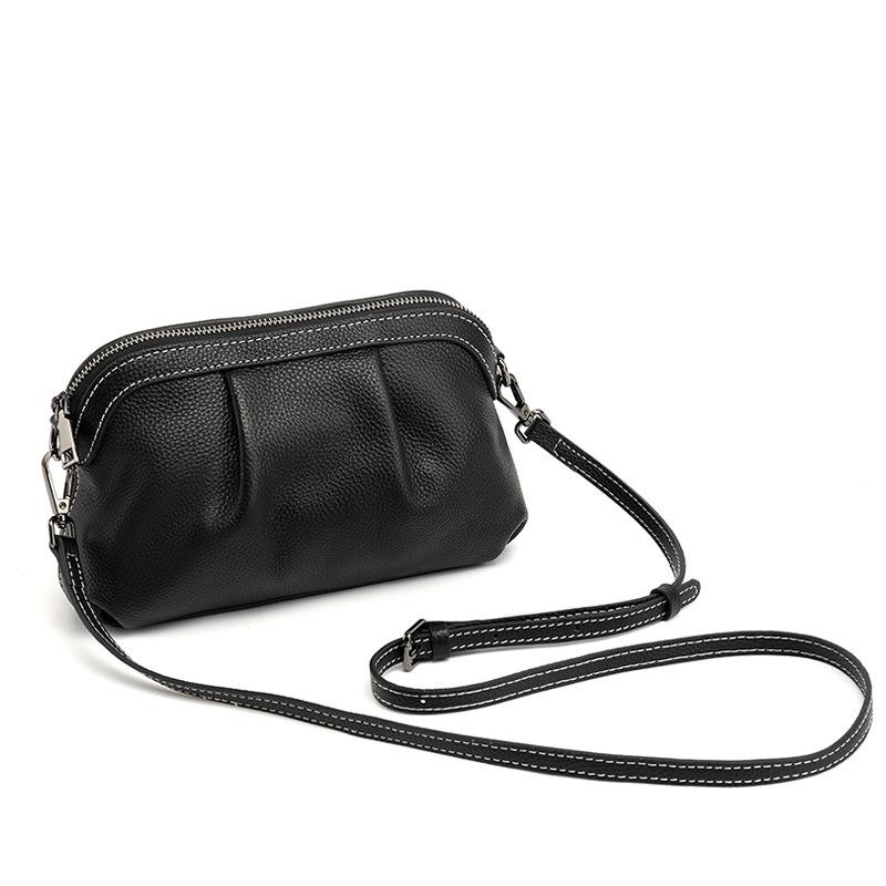

The first layer cowhide small bag, the new versatile fashion shoulder bag, simple pleated mother bag, messenger bag. чёрный