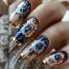 Elegantní tmavě modré květinové tipy na nehty - Retro styl se zlacenými akcenty