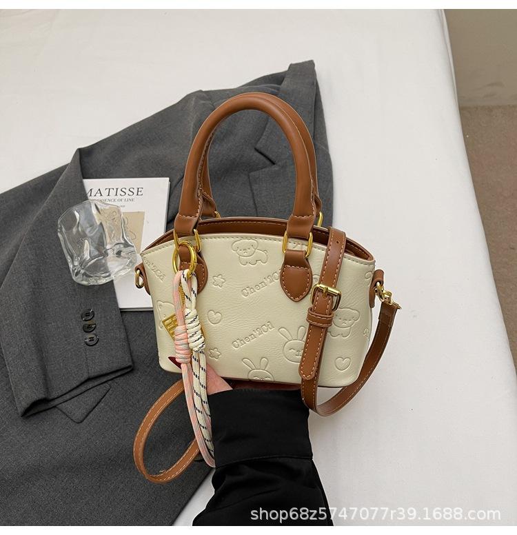 High-end Texture Small Bag Women's 2025 New Fashion Embossed Handheld Bucket Bag Versatile Commuter Crossbody Bag