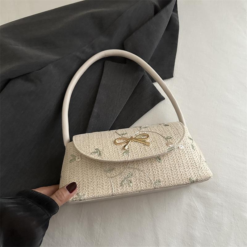 Fashion Versatile Straw Woven Bag Women'S Autumn High-Value Bow Thorn Shoulder Embroidered Armpit Bag