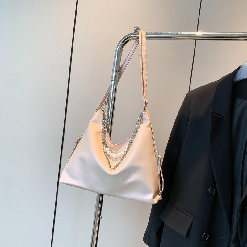 

Simple and fashionable women s bag 2024 new work commuter messenger bag large capacity beautiful casual tote bag рожевий