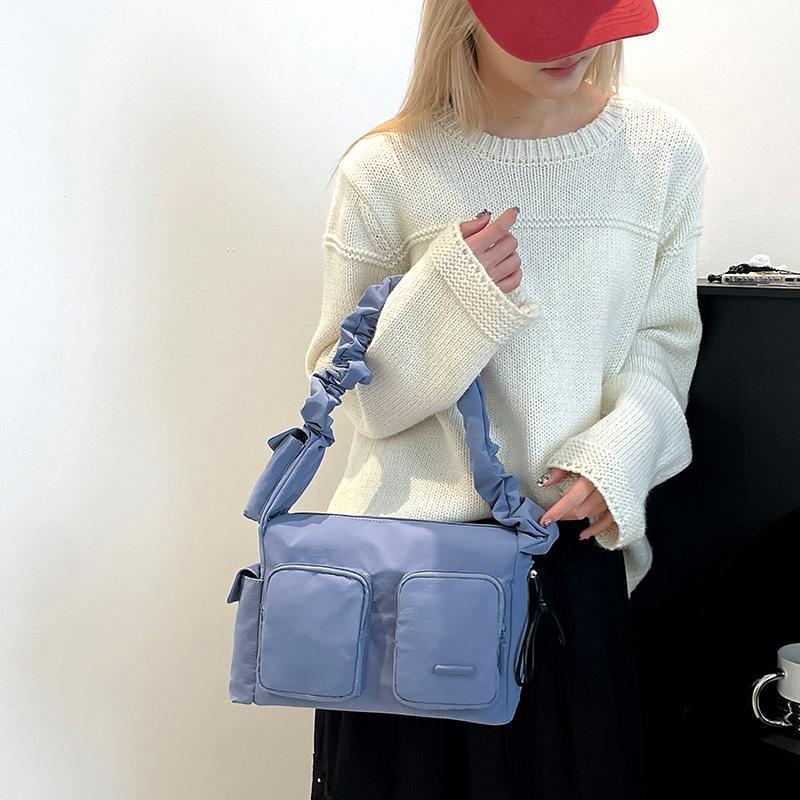 Neuer Design-Sinn einfache Damen-Tasche plissiert lässig vielseitig Nische Schulter Achseltasche