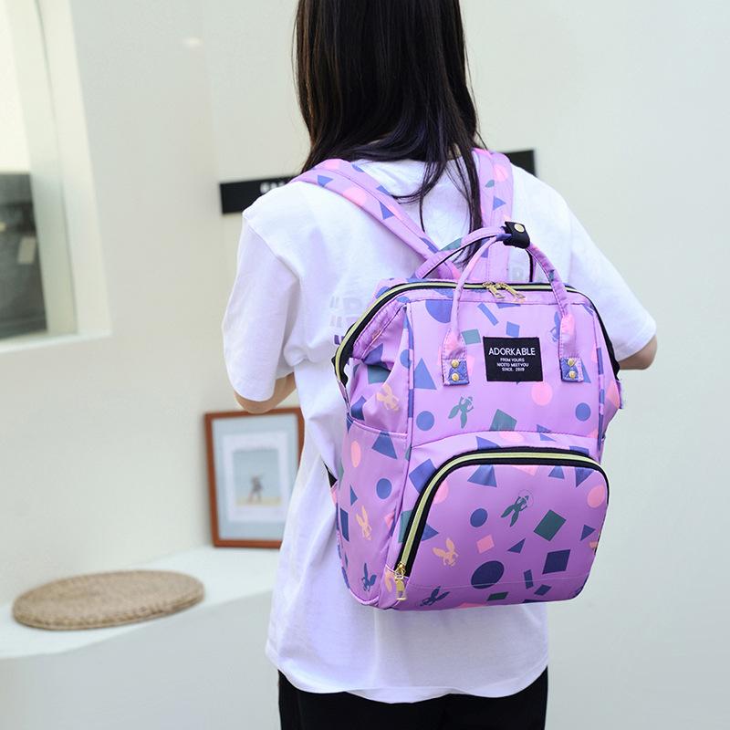 Schoolbag1011 New Mommy Bag Large Capacity Backpack Portable Maternal and Infant Bag Women's Storage Milk Bag Cartoon Printed Bag