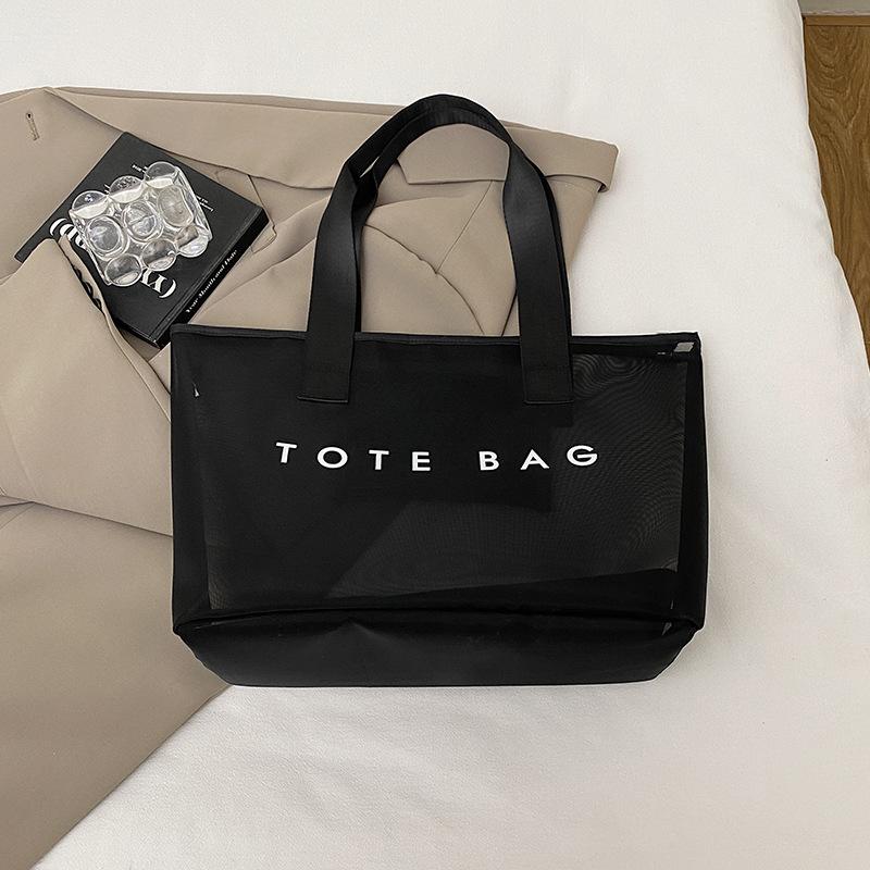 

Korean new large-capacity transparent large bag women s 2025 summer new fashion casual simple shoulder tote bag