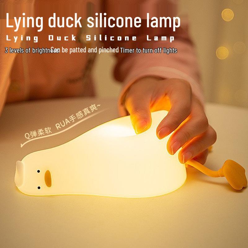 

Lying Duck Rechargeable Silicone Night Light: Bedside Table Lamp with Soft Ambient Glow Warm Light + Timer + Three-Level Adjustment