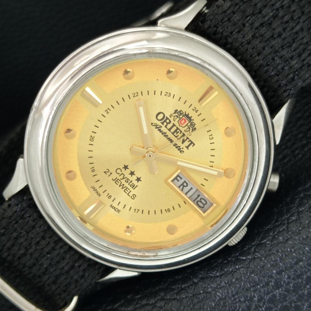 

AUTOMATIC VINTAGE ORIENT CRYSTAL 46940 JAPAN MENS GOLDEN DIAL WATCH a706945-1