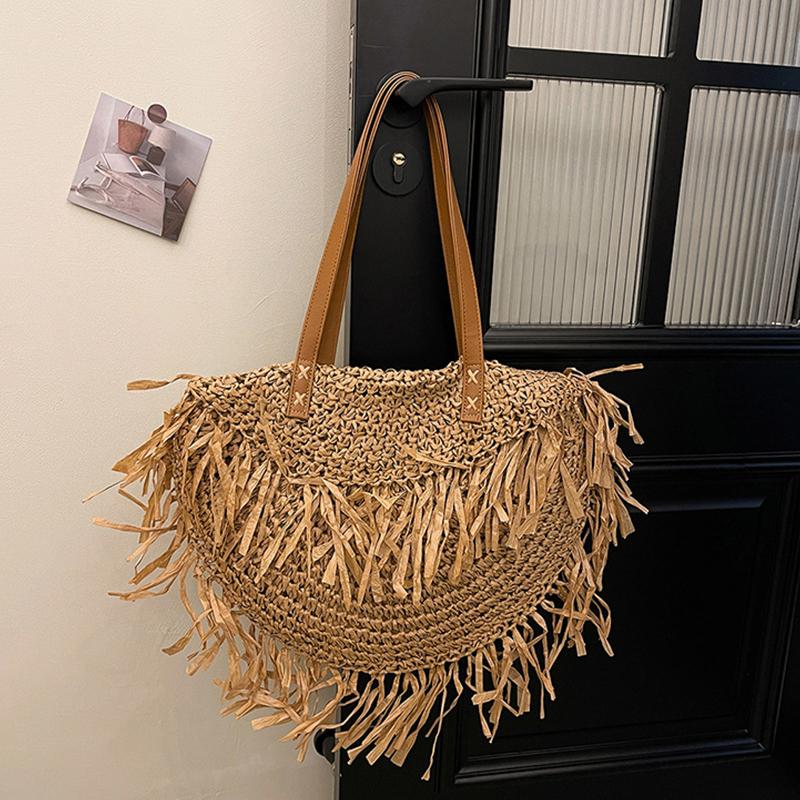 Damen Stilvolle Strick-Schultertasche mit Quaste Ausgehöhlte Flechttasche Verschleißfest Handgewebte Strandtasche Shopper Totes