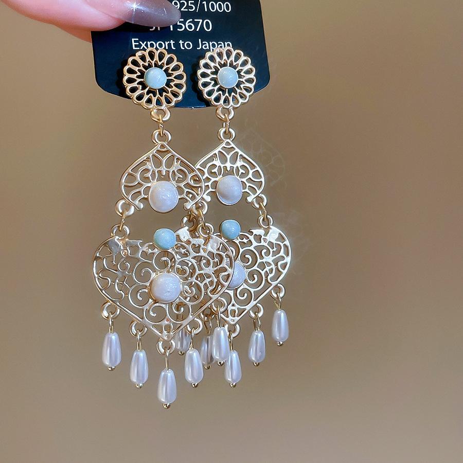 Bohemian ethnic style crystal fringed earrings stud earrings personalized design sense niche earrings women