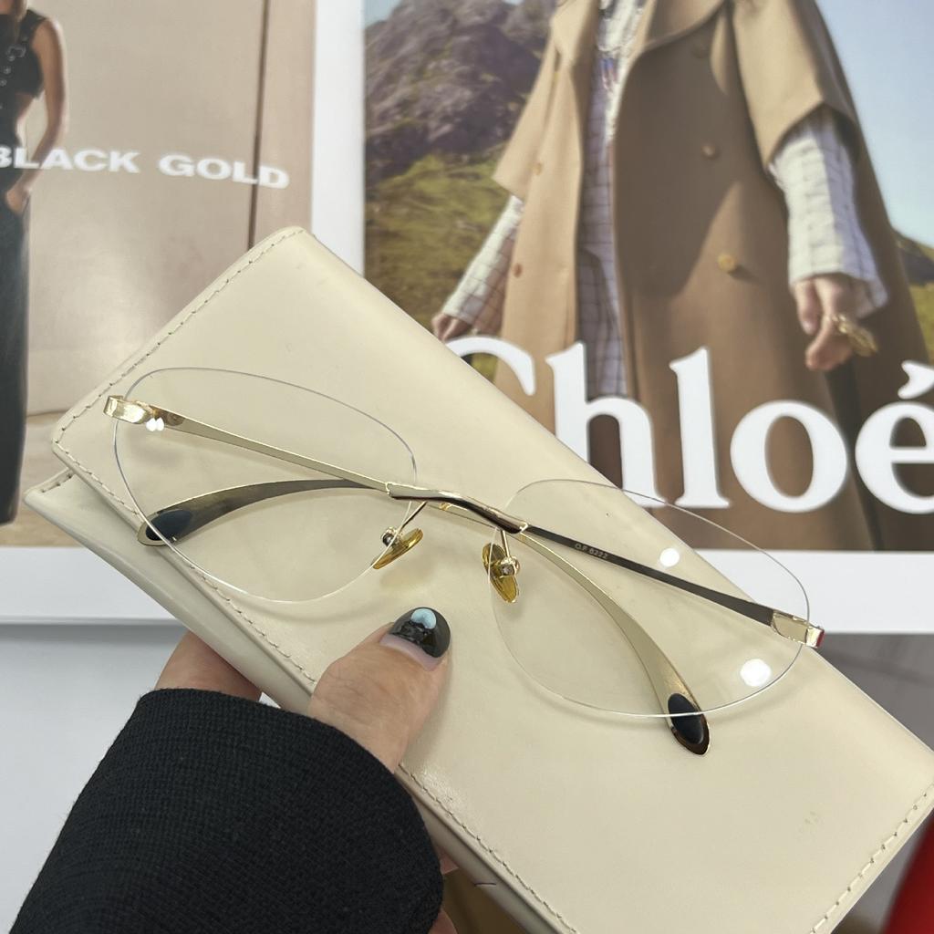 New Y2K Sunglasses for Women Rimless Luxury Brand Sun Glasses Future Korean Styles Cat Eye Frame Anti UV400 Glasses