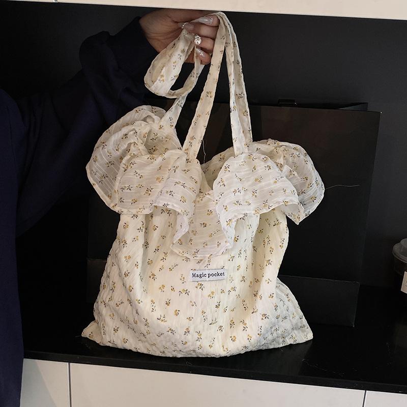 2025 spring and summer new mesh shoulder bag fairy wind lotus leaf edge handbag female vacation sewn chiffon tote bag