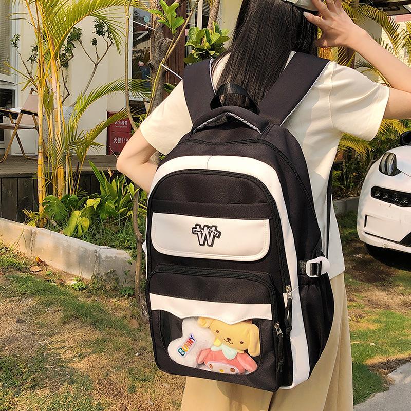 College junior high school student schoolbag, primary school student contrasting color backpack, new large-capacity high-value schoolbag