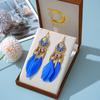 Modische Bohème-Ohrringe mit langen Federn für Damen, Ethnische Vintage-Blattperlen, Ohrringe aus Metall in Goldfarbe, Schmuck für Urlaubs- und Party-Anlässe